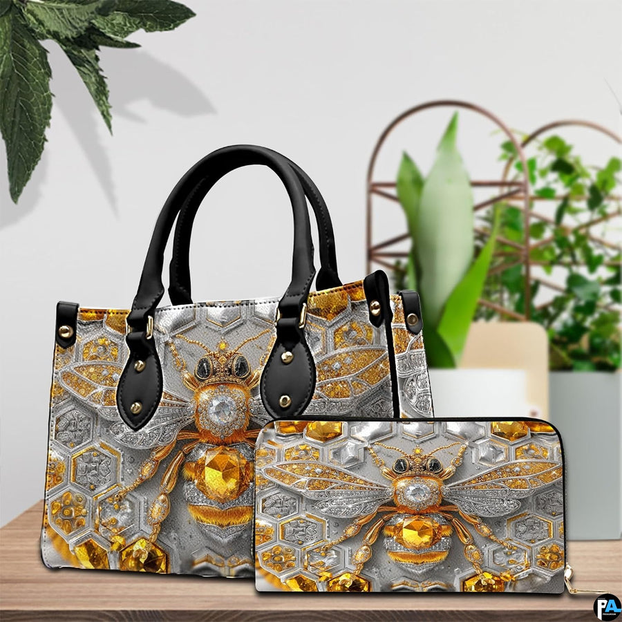 Back view of bee handbag displaying continuous silver and amber hexagonal honeycomb pattern.
