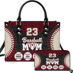 Maroon baseball seam handbag and matching zip wallet shown against studio background with athletic graphics.