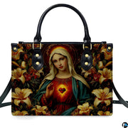 Virgin Mary with golden lilies and radiant Immaculate Heart front view handbag