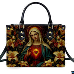 Virgin Mary with golden lilies and radiant Immaculate Heart front view handbag