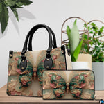 Tabletop display showing emerald Rococo butterfly handbag and matching wallet beside indoor plants