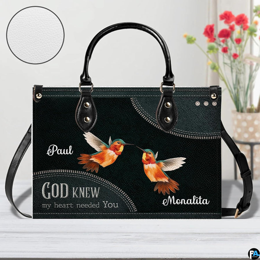 Side perspective view of hummingbird accessory on plain studio background