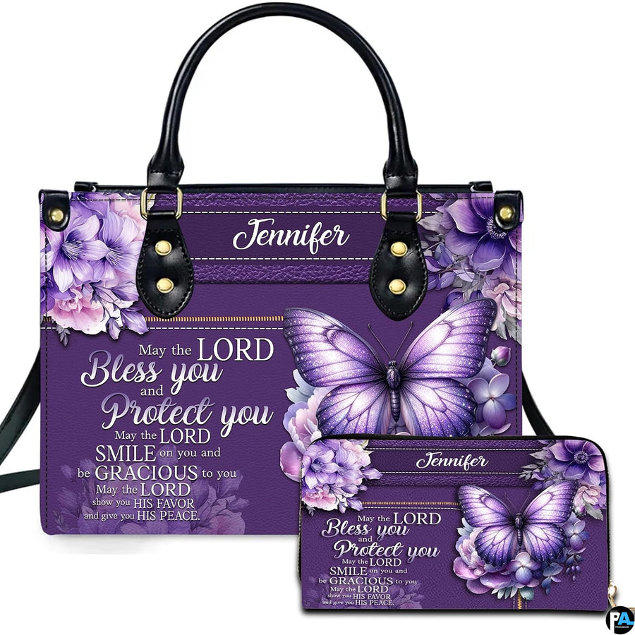 Front view of violet floral butterfly handbag and matching wallet with lavender hydrangea clusters.