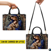 Dual view demonstrating handheld elevation and shoulder suspension of sacred art accessory.