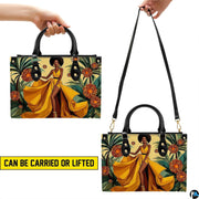 Dual presentation displaying handheld and hanging orientations of the golden gown art accessory.
