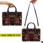 Dual view demonstrating top handle and long shoulder wear options with purple bookstore illustration.