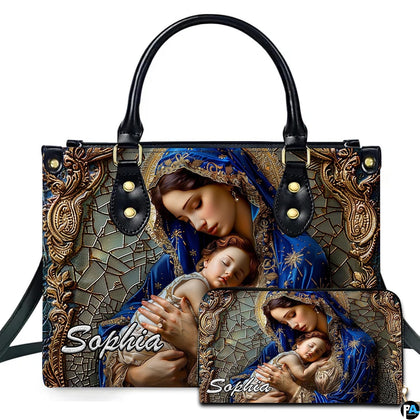 Virgin Mary and sleeping Christ child mosaic art on matching two-piece ensemble on white backdrop.