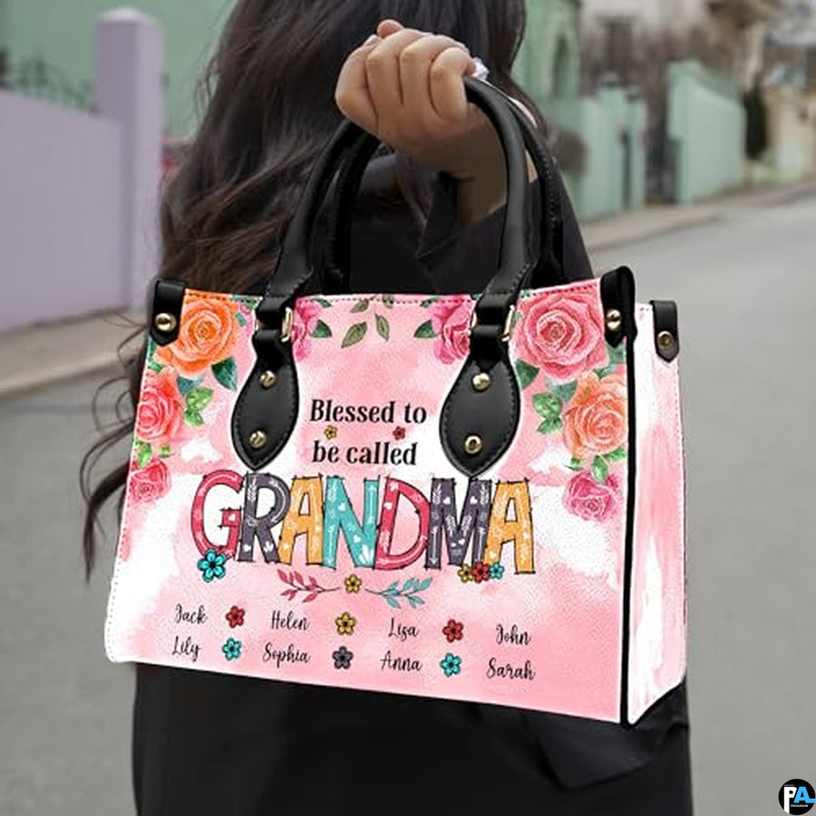 Pink floral handbag carried outdoors with rose artwork
