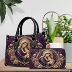 Handbag and matching wallet set featuring purple Madonna and Child art on wooden table