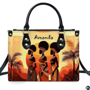 Direct frontal view of the three women silhouettes and glowing sun landscape on a neutral studio backdrop.
