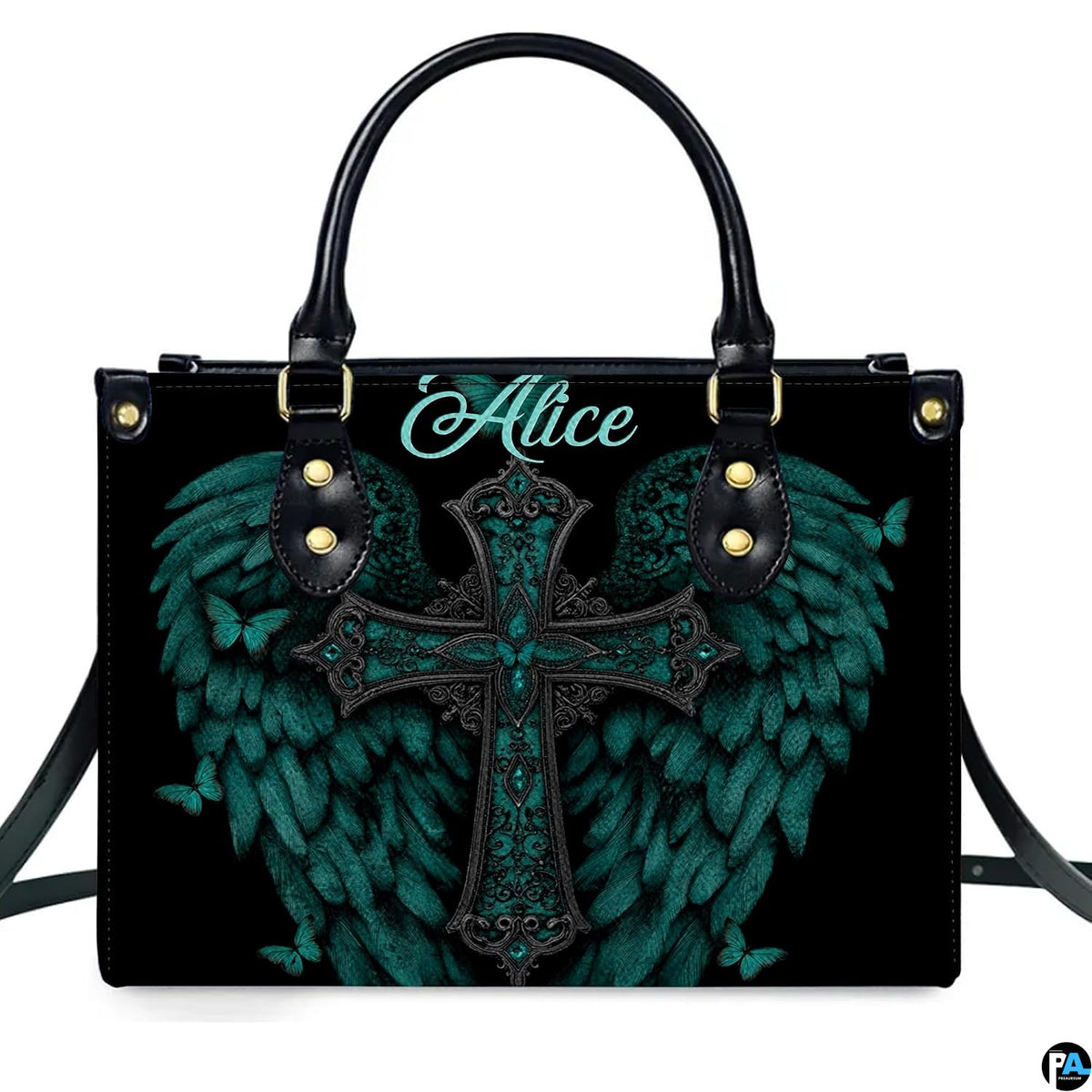 Angled perspective view of turquoise angel wings cross handbag highlighting feathered details.
