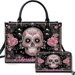 Pink sugar skull handbag and matching wallet set featuring calavera artwork with roses on black lace.