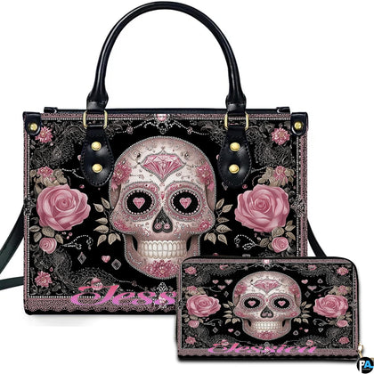 Pink sugar skull handbag and matching wallet set featuring calavera artwork with roses on black lace.