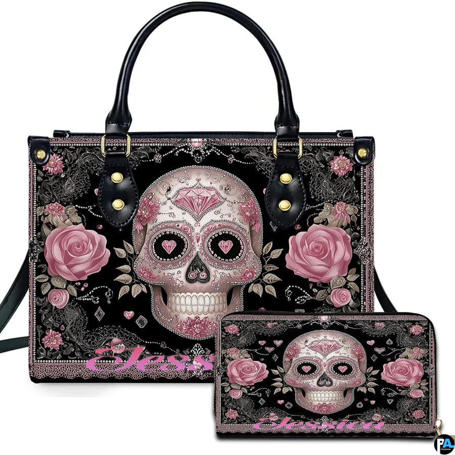 Pink sugar skull handbag and matching wallet set featuring calavera artwork with roses on black lace.