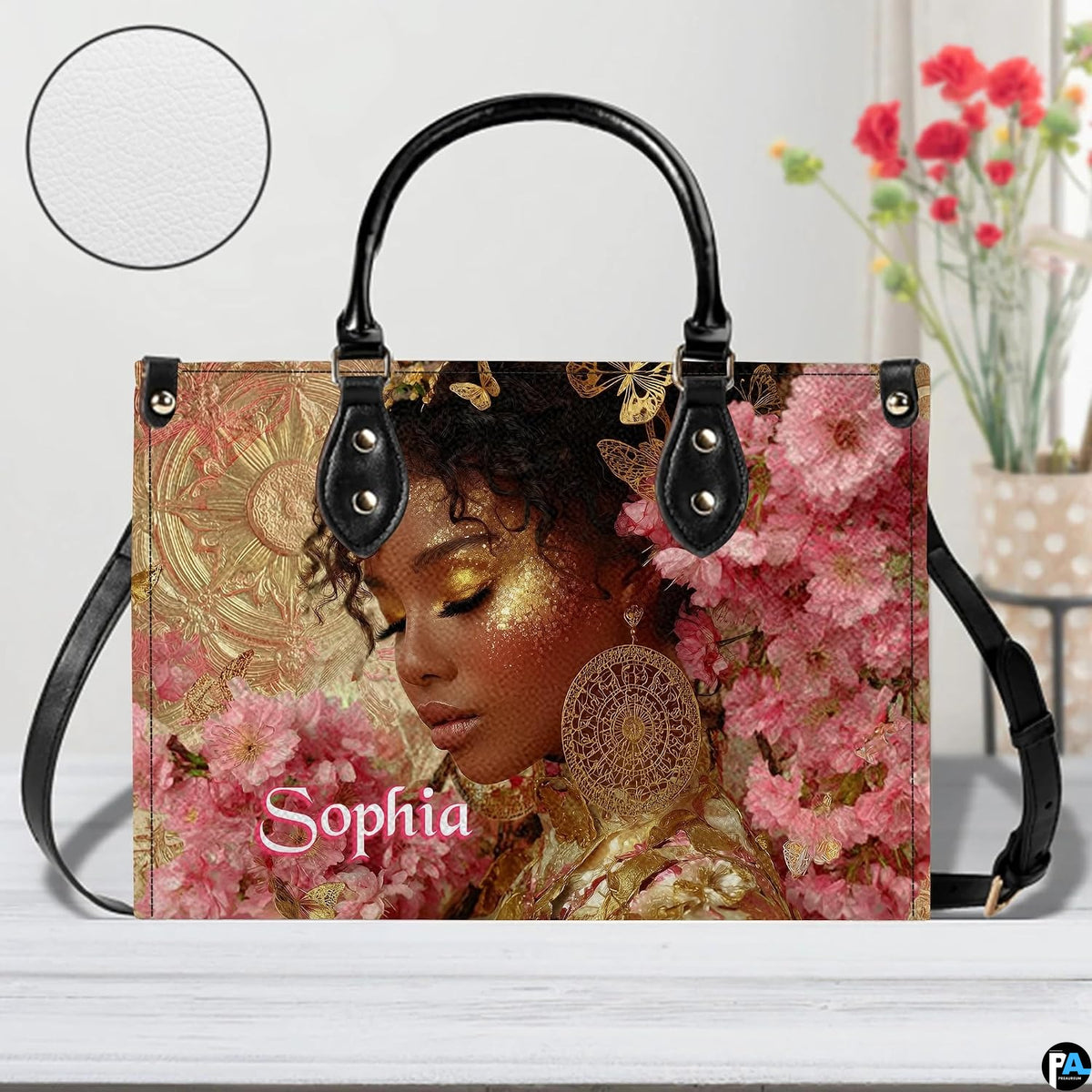 Tabletop view of golden glow afro art accessory featuring surface detail swatch inset.