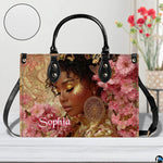 Tabletop view of golden glow afro art accessory featuring surface detail swatch inset.