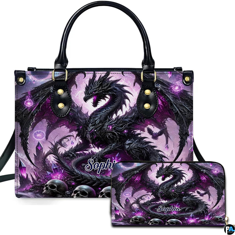 Gothic black dragon handbag and matching zip wallet set featuring glowing purple crystals and weathered skulls.