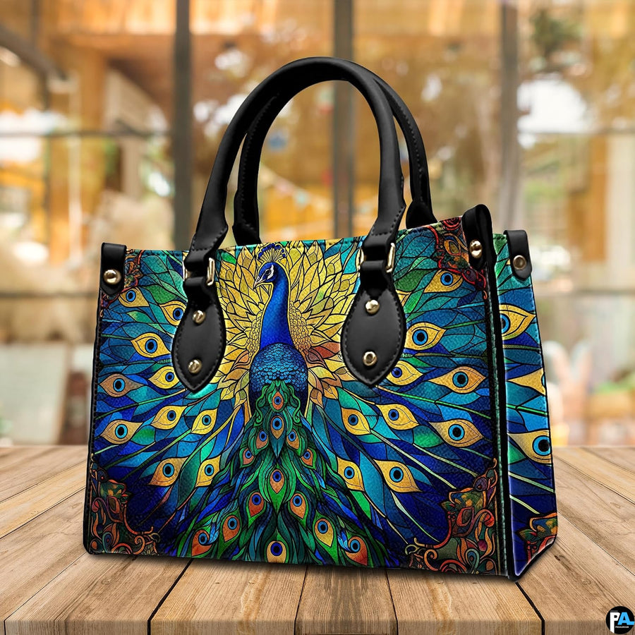 Angled peacock handbag with cobalt teal emerald and gold artwork