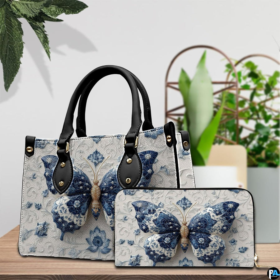 Blue porcelain butterfly handbag and matching wallet displayed on tabletop setting