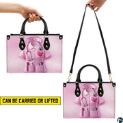 Top down view of pink nurse handbag displaying spacious interior opening