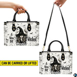 Graphic illustrating handheld top handle and shoulder suspended holding styling.