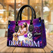 Arrangement of canine handbag and wallet presenting the unified retro synthwave theme.
