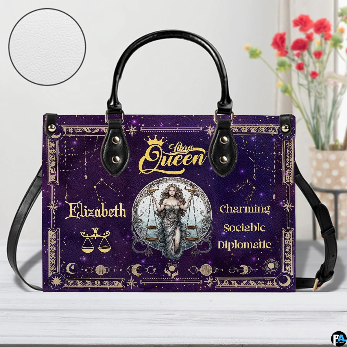 Celestial Scales Satchel Handbag resting on white surface beside floral vase with circular texture inset.