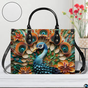 Geometric peacock handbag with orange teal feather-eye circles and flowers