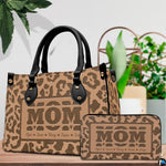 Tabletop presentation of tan leopard print design positioned beside lush indoor greenery.