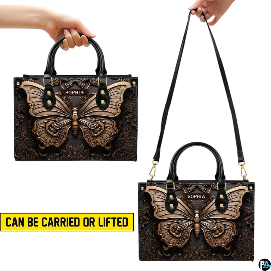 Carrying options demonstration illustrating handheld and shoulder wear for the bronze butterfly handbag.