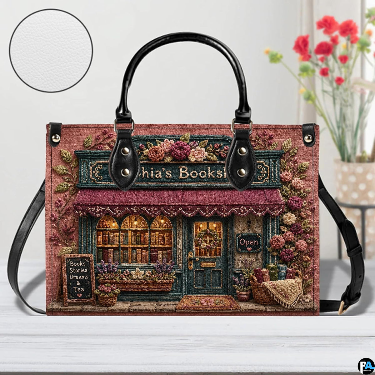 Angled view showing the detailed rose-covered shopfront facade printed across the handbag.