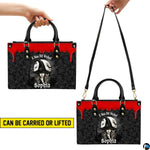 Dual view demonstrating top handle and long shoulder wear options with gothic sorceress illustration.