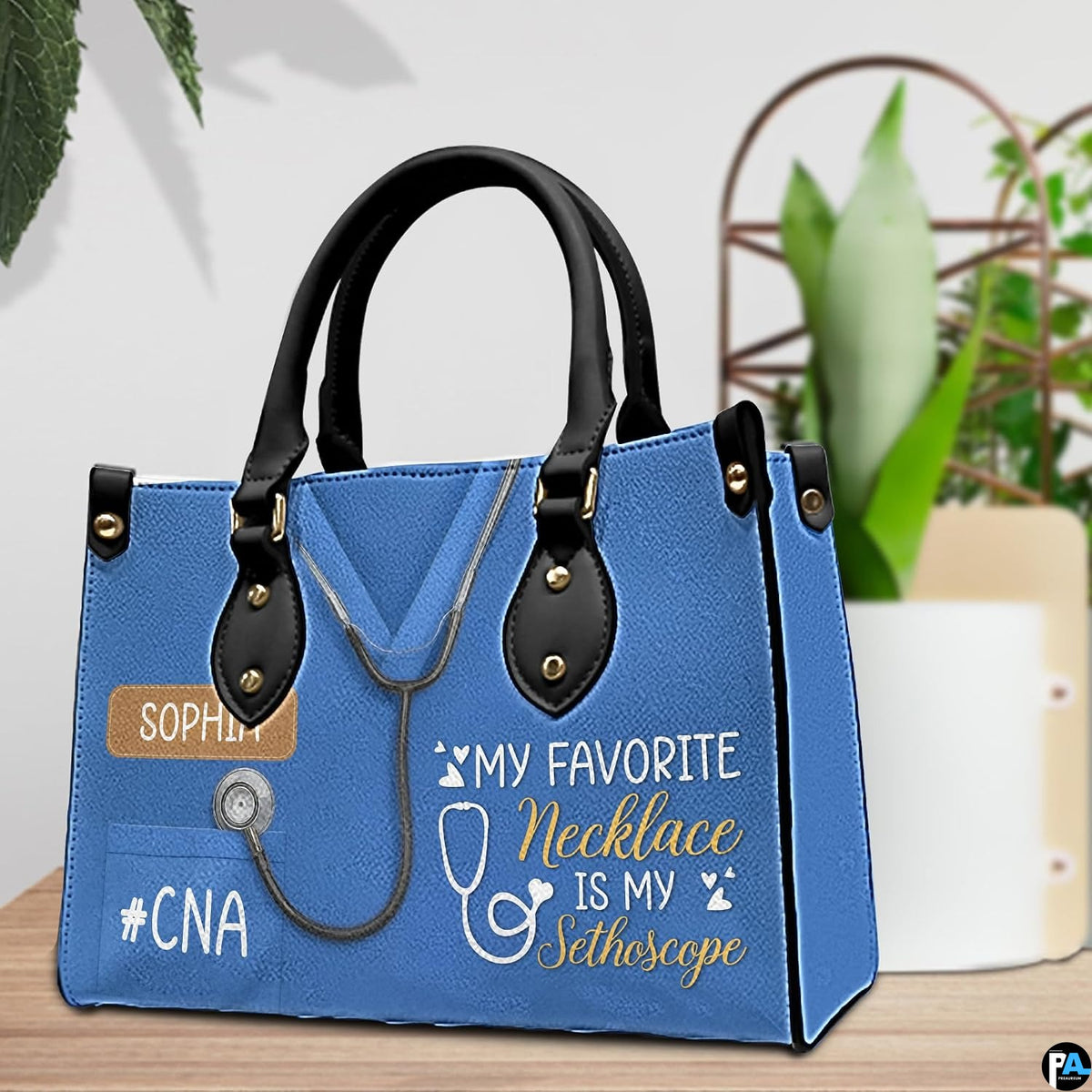 Close-up view of medical scrub uniform chest detail and stethoscope graphic