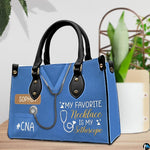 Close-up view of medical scrub uniform chest detail and stethoscope graphic