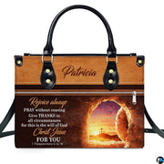 Front product view of the empty tomb and Calvary sunrise Christian handbag