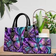 Close-up front view of handbag showing crystal butterfly wings and blossoms