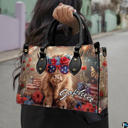 Outdoor street perspective displaying illustrated accessory carried by model in casual clothing