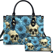 Gothic skull blue floral daisy handbag and matching wallet set on white background.