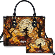 Stained glass Halloween witch moon handbag and matching wallet set displayed upright on white background.