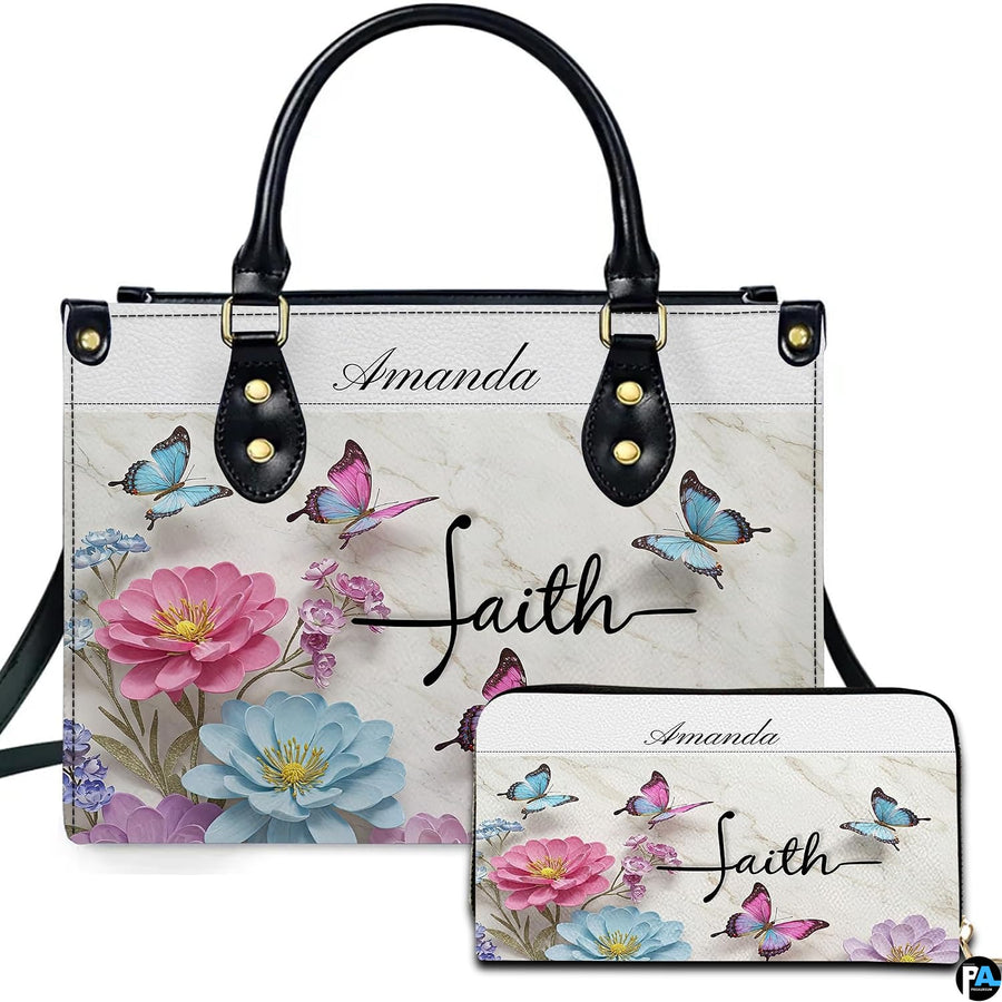 Front view of floral butterfly cross handbag and matching wallet set with pastel blossoms on marble