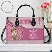 Chibi nurse handbag displayed indoors alongside floral vase with circular texture swatch inset.