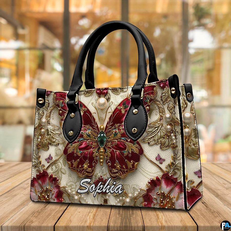 Alternative angle display of baroque ruby butterfly handbag and wallet set