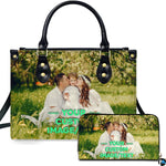 Sunny meadow family portrait handbag paired with matching companion wallet on clean white background.