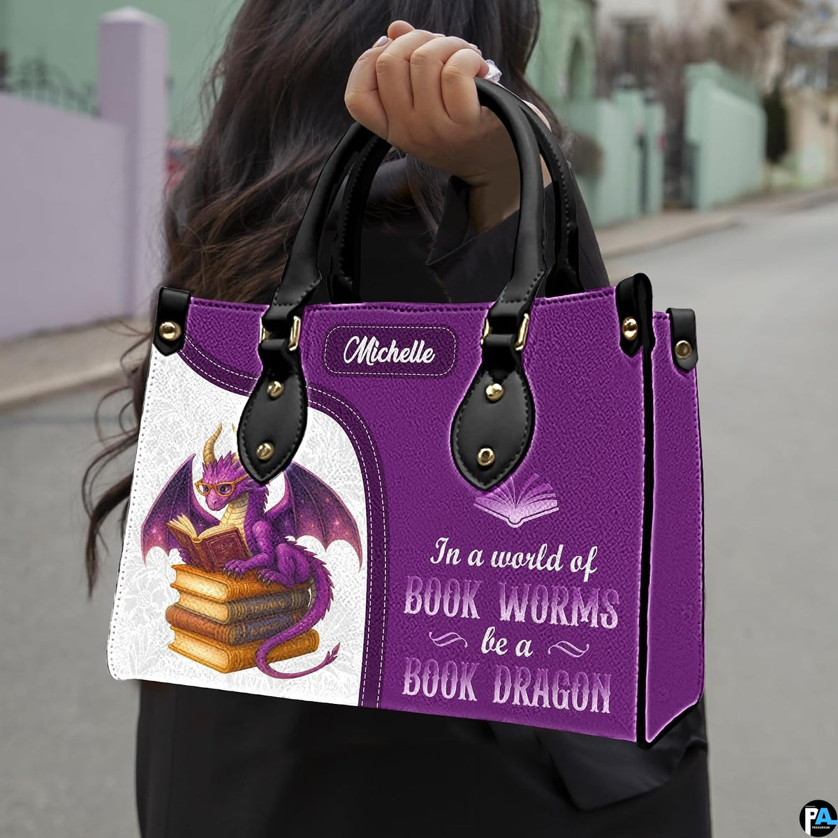 Product diagram highlighting handle buckles, removable shoulder strap, zipper pull, and lining.