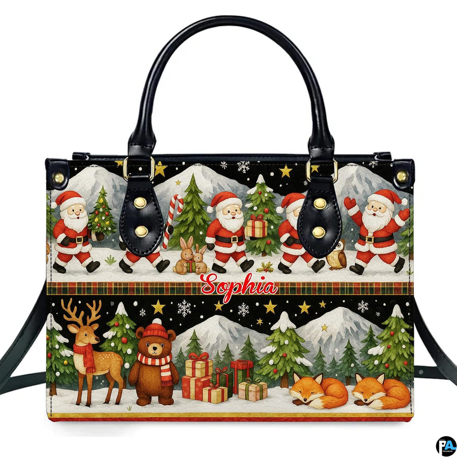 Front view of Santa and woodland animals Christmas handbag paired with matching holiday wallet on white surface.