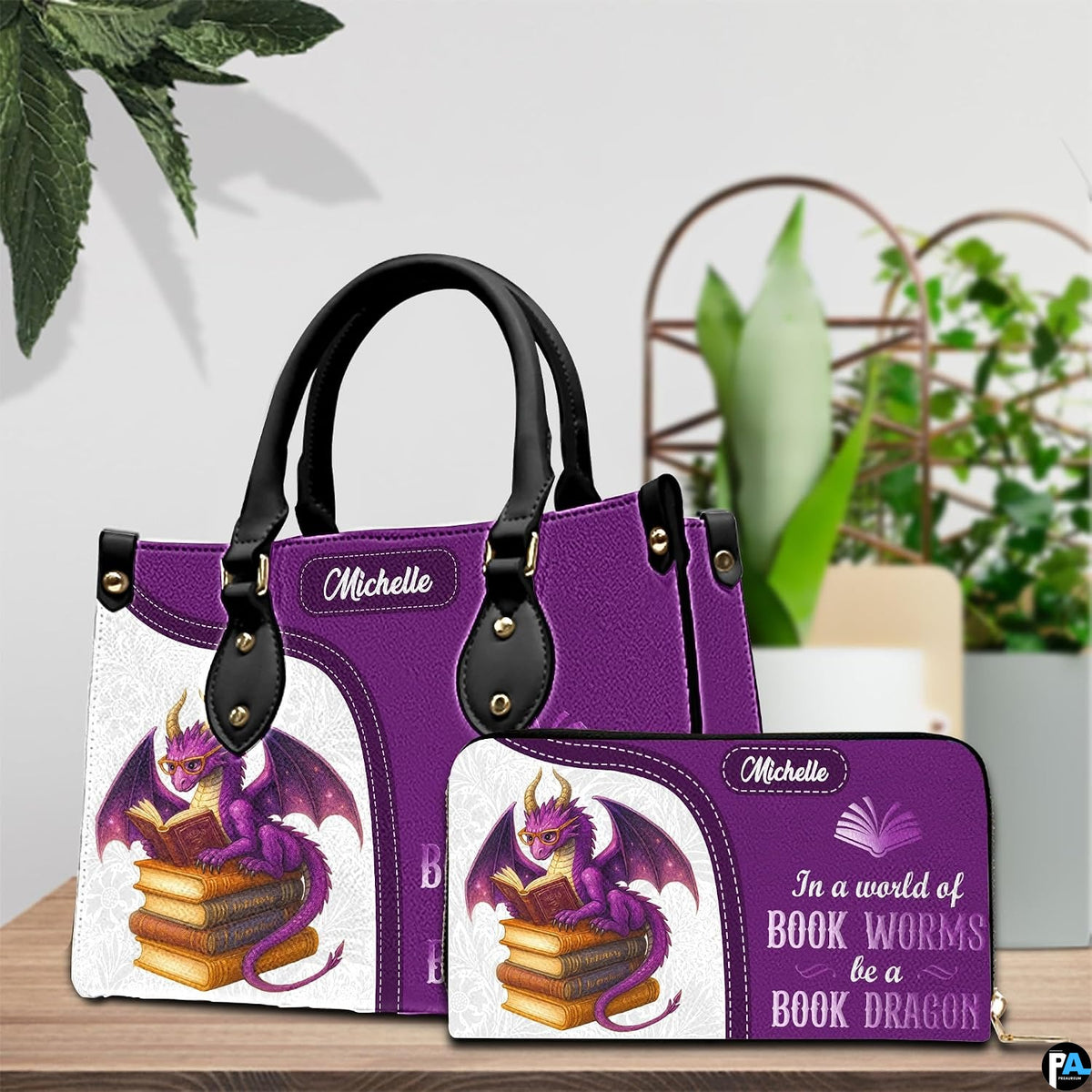 Model carrying the purple fantasy dragon handbag outdoors displaying the front bookish artwork.