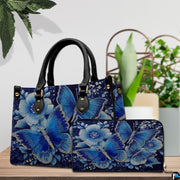 Side profile view of structured butterfly handbag with sleek silhouette and dark carrying handles.