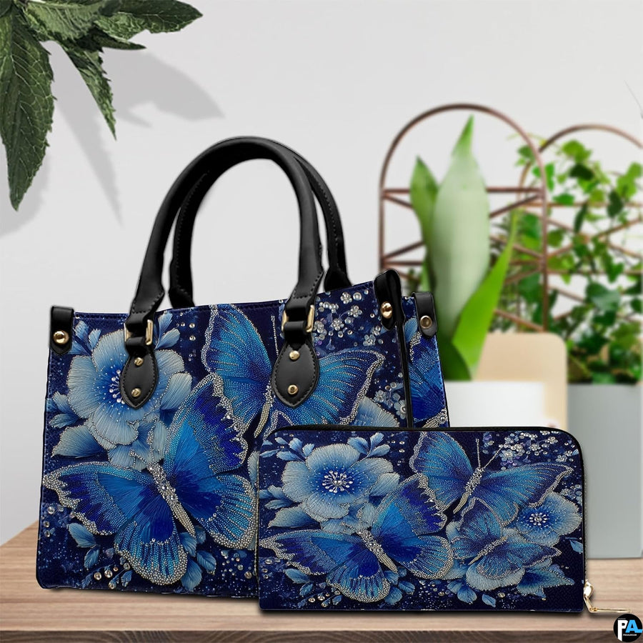 Side profile view of structured butterfly handbag with sleek silhouette and dark carrying handles.
