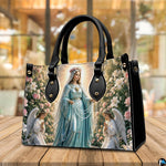 Top view of rosary handbag displaying top zipper opening and carry handles