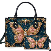 Studio presentation showing baroque teal jewel butterfly artwork alongside matching companion on white surface.